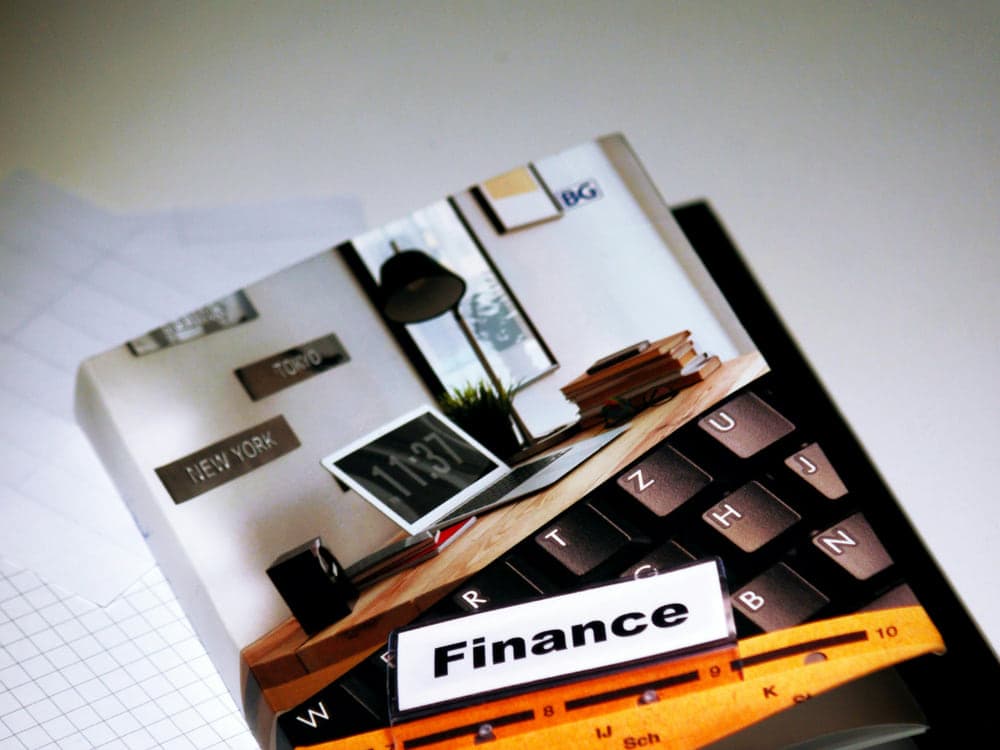 A finance file on an office desk